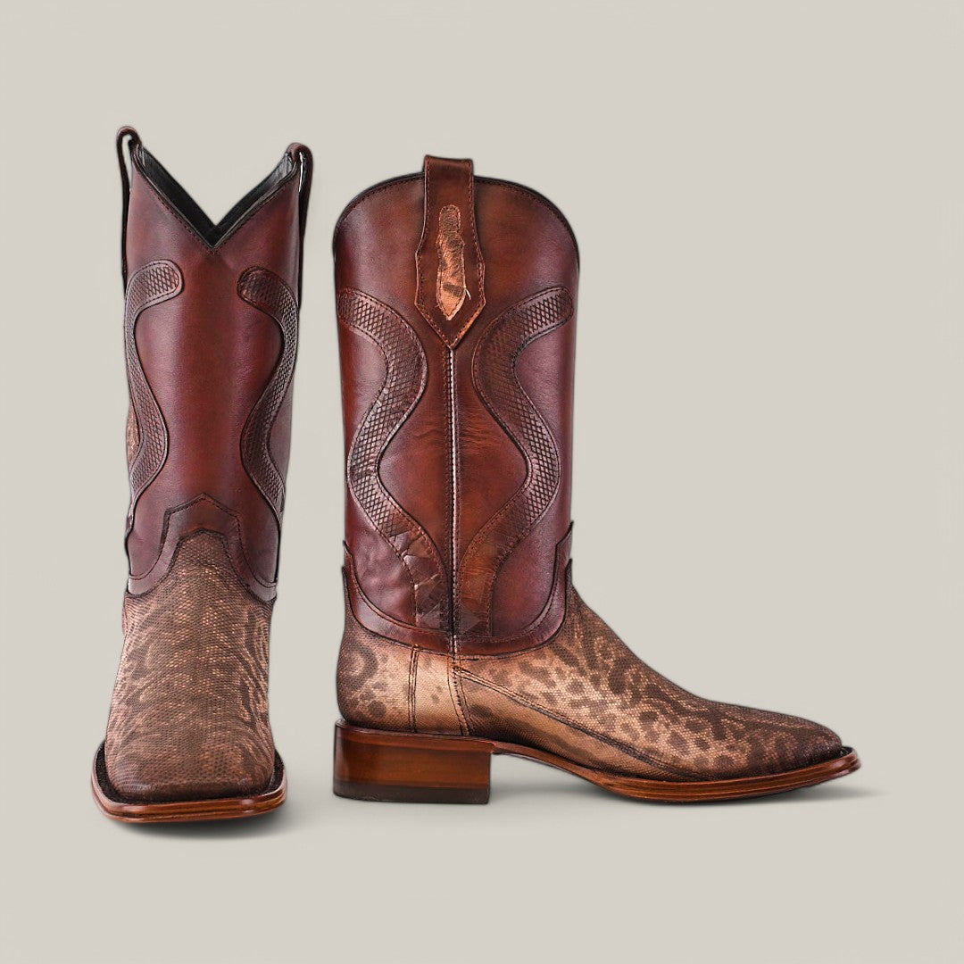 The Exotic Carunga - Diamond boots, set against a neutral background, feature genuine exotic leather with decorative stitching and a textured pattern on the lower half. The sturdy wooden heel enhances the timeless cowboy charm of this natural square toe design.