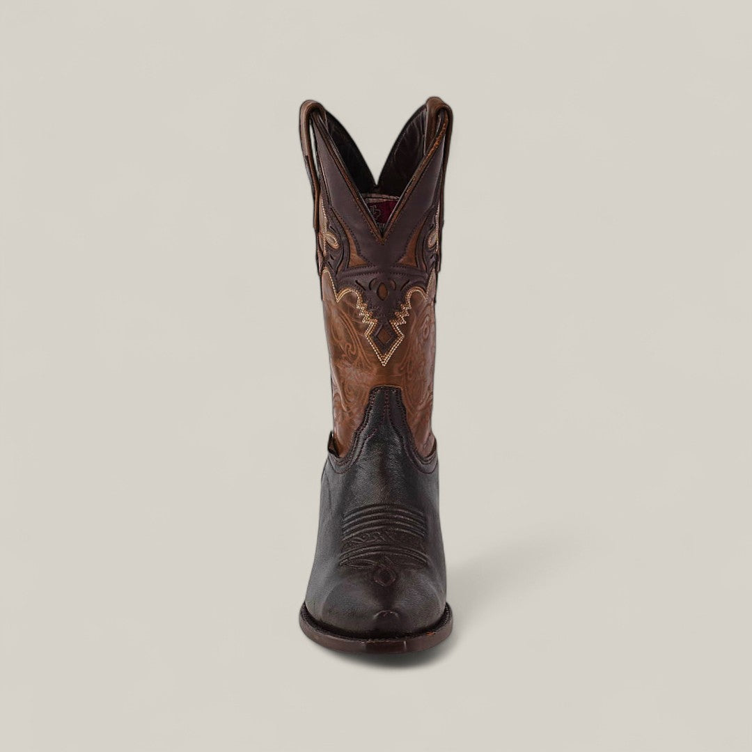 The Rush - Brown - Snip Toe showcases a single cowboy boot in Marlboro style, featuring a dark brown foot and a lighter, intricately stitched upper shaft, displayed front view on a plain light background.