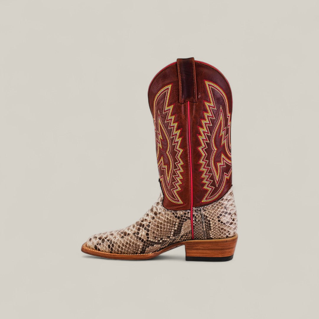 The Exotic Python - Natural - Square Toe features a snakeskin-patterned foot, tan wooden heel, and high maroon leather shaft with yellow and red stitching. Displayed on a light background. Part of the Platinum Collection.