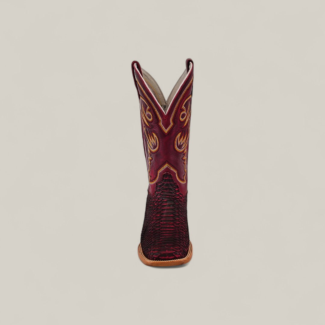 The Exotic Python - Cherry Nobuck - Square Toe boot, featuring a dark red and black textured pattern, tan sole, and decorative yellow stitching, is displayed from the front against a plain light background.