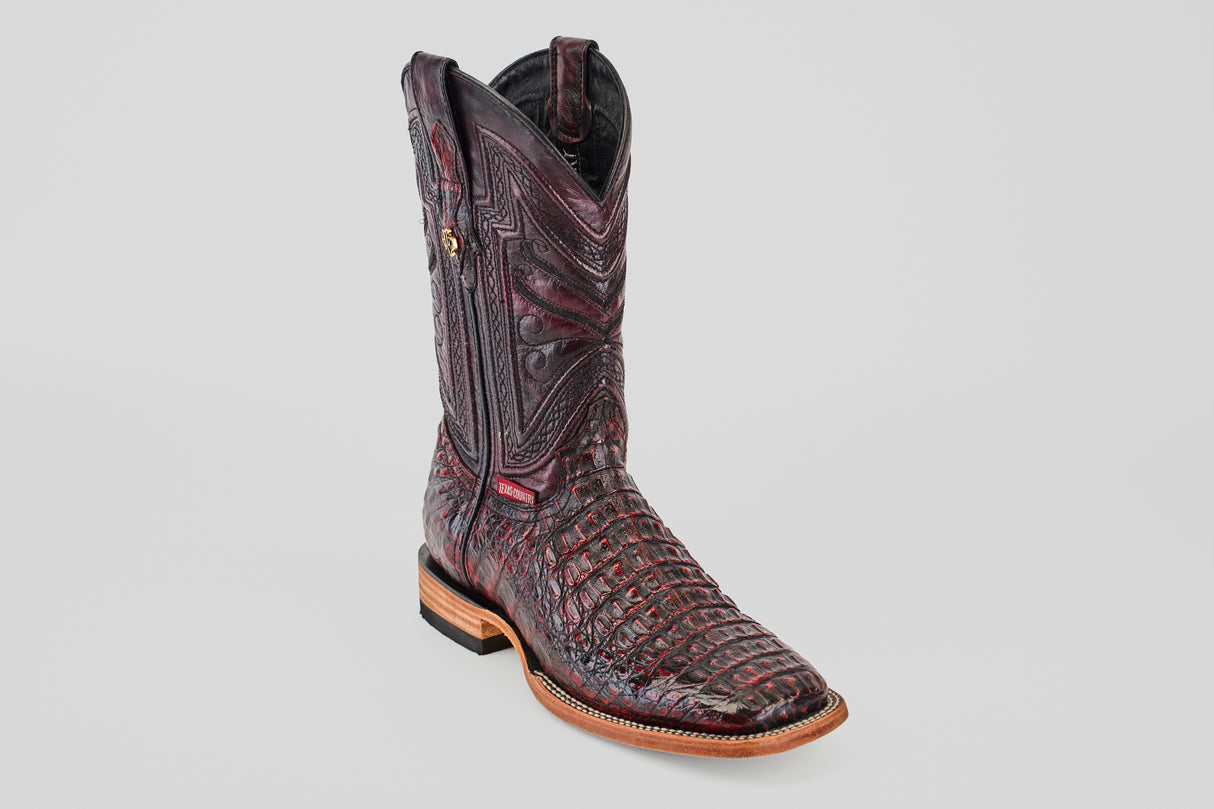 A single Exotic Caiman Horn Back boot in Black Cherry with a detailed textured pattern, square toe, and light wooden sole is displayed on a plain light gray background.