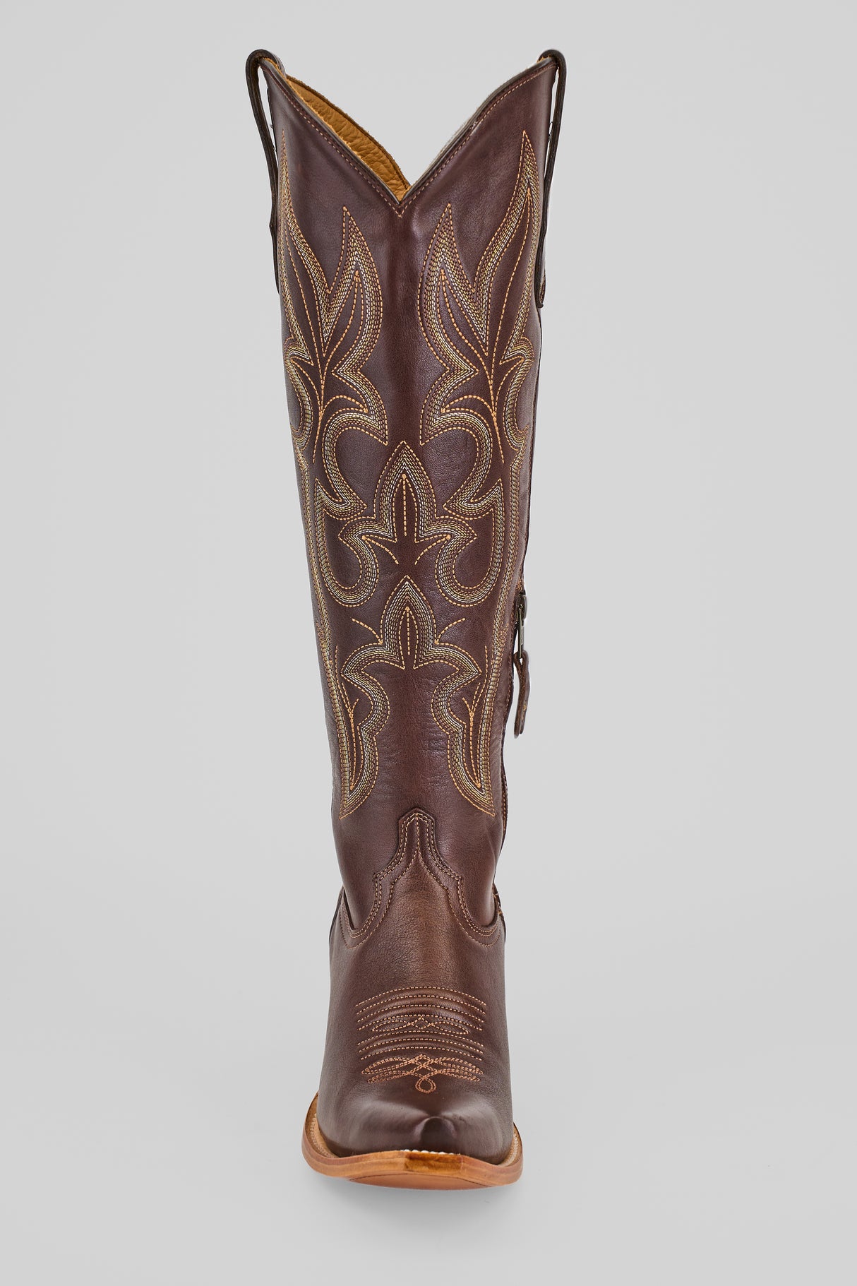 The Allison Dark Moka Tall Shaft Snip Toe boot for women, in dark mocha leather with detailed light stitching on the shaft, is shown from the front against a plain light background.