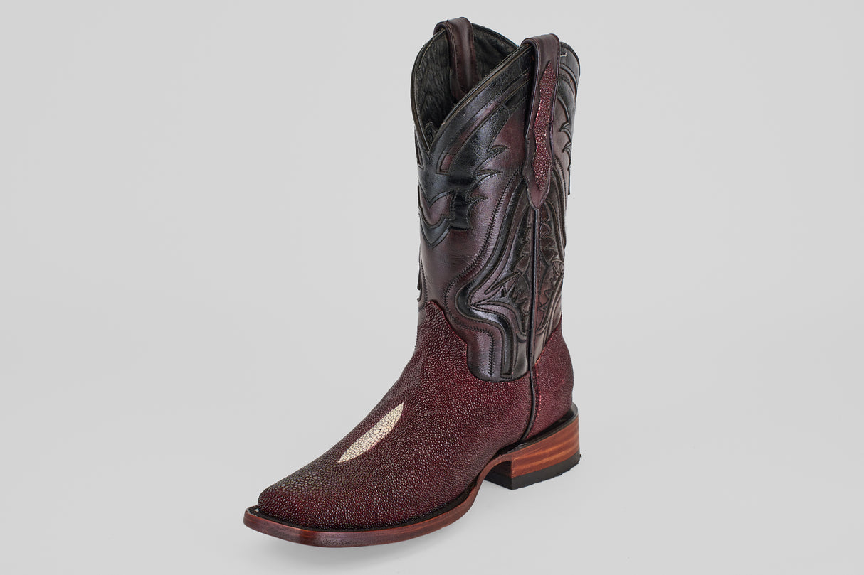 The Ranger – Wine – Rodeo Toe is a tall, dark brown cowboy boot featuring intricate stitching, a textured finish, a white inlay on the rodeo toe, and a wooden heel, shown on a plain light gray background.
