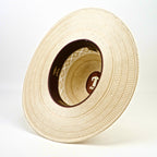 Beige straw hat with a brand logo on a white background