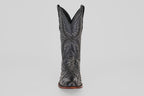 The Exotic Full Quilt Ostrich - Black - Round Toe boot features decorative stitching and classic Western style, displayed front-facing against a plain light gray background.