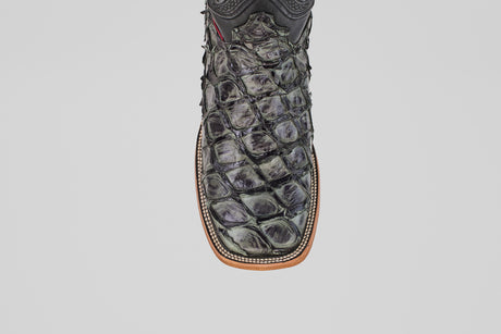 The Conor - Charcoal - Square Toe is a black cowboy boot with a square toe and brown sole, ideal for men seeking stylish western footwear.