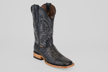 The Caiman Belly Black - Embossed Leather - Square Toe (E423) boot features intricate stitching, pull straps, and a light brown wooden heel, displayed on a plain gray background—ideal for stylish casual western wear.