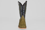 The Tanner - Green Jungle - Square Toe boot features a textured green snakeskin foot, a black leather shaft with yellow and green stitching, and classic western style, shown front-facing on a plain light background.