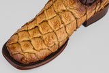 A close-up of the Conor Platinum - Buttercup - Square Toe (Herradura) boot shows textured, reptile-like leather, detailed stitching, and a wooden sole—an ideal standout western boot for men.