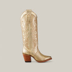 The stunning Linda Tall Shaft Gold - J Toe boot from the Platinum Collection features intricate gold stitching, a tall shaft, uniquely rounded pointed toe, mid-height wooden heel, and pull straps for easy wear.